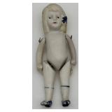 Collection of Antique German Bisque Doll Figurines including Dionne Quintuplets and Half Doll