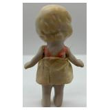 Collection of Antique German Bisque Doll Figurines including Dionne Quintuplets and Half Doll