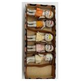 Collection of Antique German Bisque Doll Figurines including Dionne Quintuplets and Half Doll
