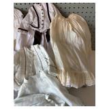 Collection of Vintage Doll Dresses with Lace and Ribbon Details