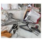 Assorted Doll Dress Patterns with Variety of Miniature Hangers