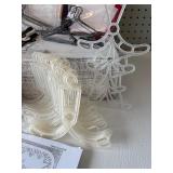 Assorted Doll Dress Patterns with Variety of Miniature Hangers