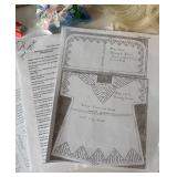 Assorted Doll Dress Patterns with Variety of Miniature Hangers