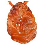 Vintage Heavily Carved Stone Pendant on Braided Cord