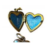 Four Vintage and Antique Heart Pendants including a 14K Gold Pendant and 10K Pendants