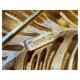 Assorted Vintage Brooches including Vintage Crown Trifari Brooches and a Vintage Coro Brooch