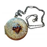 Antique Gold Tone Locket with Red Gemstones