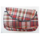 Raingear, ponchos, wooden cross, vintage bag