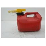 2.5 gallon gas can with 1.25 gallons of gas