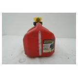 2.5 gallon gas can with 1.25 gallons of gas