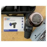 Brookstone Cordless Hot and Cold Percussion Deep Tissue Massager Gun, 6 Intensity Levels