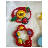 Collection of Assorted Baby Toys with Rattles and Figures