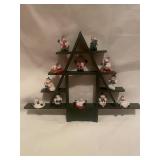 Snowman Figurine Collection on Triangular Display Shelf