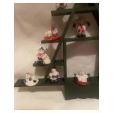 Snowman Figurine Collection on Triangular Display Shelf