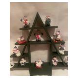 Snowman Figurine Collection on Triangular Display Shelf