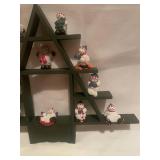 Snowman Figurine Collection on Triangular Display Shelf