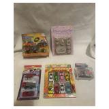 Collection of 6 Toy Sets including Mini Monster Trucks and Porcelain Tea Set