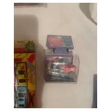 Collection of 6 Toy Sets including Mini Monster Trucks and Porcelain Tea Set