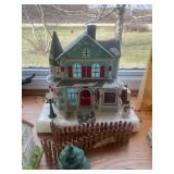 Assorted Collection of Christmas Village Houses and Figurines