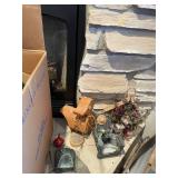 Assorted Decorative Items Including Figurines, Candle Holders, and Floral Arrangements