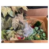 Assorted Decorative Items Including Figurines, Candle Holders, and Floral Arrangements