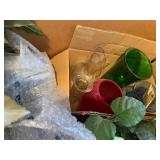 Assorted Decorative Items Including Figurines, Candle Holders, and Floral Arrangements