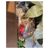 Assorted Decorative Items Including Figurines, Candle Holders, and Floral Arrangements