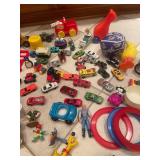 Collection of Assorted Vintage Toys Including Cars and Figures
