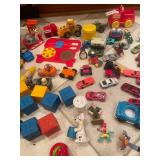 Collection of Assorted Vintage Toys Including Cars and Figures