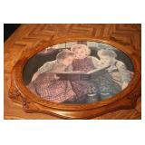 28" by 22" framed picture of three ...