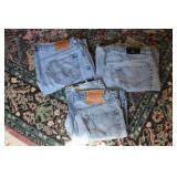 3 pairs of levi jeans sizes are pic...