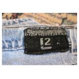 3 pairs of levi jeans sizes are pic...