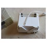 Mountable can opener and radio...