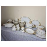 William Guerin & Co French Limoge China Service with Gold Brimmed Design