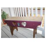 Rustic Wooden Bench with Heart Cutouts and Floral Details