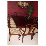 Elegant Dining Table with 10 Chairs and Extra Leaf