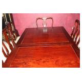 Elegant Dining Table with 10 Chairs and Extra Leaf