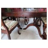 Elegant Dining Table with 10 Chairs and Extra Leaf