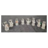 8 Handblown Glass Angels created by Edward Carberry.  The figurines are approximately 3" tall.