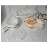 Vintage Pyrex Bowls, Casserole, Platter , and a Santa Hot Plate.