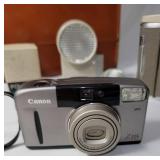 Camera Package.  Vintage 1957 Polaroid 800 camera with leather case and all accessories.  Canon Z115 and Kodak Mini 600 camera