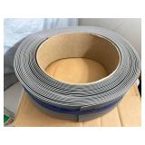 New Rolls of Commercial Vinyl Baseboard and Adhesive