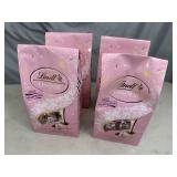 4 New Bags of Lindt Special Edition Neapolitan White Chocolate Truffles.