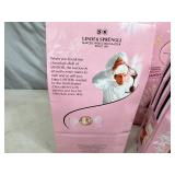 4 New Bags of Lindt Special Edition Neapolitan White Chocolate Truffles.