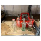 coke bottles and Carrier 12 bottles
