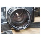 Minolta SRT101 35mm SLR Camera with Lenses and Accessories