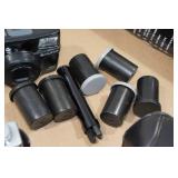 Minolta SRT101 35mm SLR Camera with Lenses and Accessories