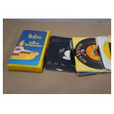 Assorted 45 RPM Vinyl Records and the Beatles VHS