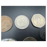 Six Good Quality Foreign Coins: 1900 GB 6 Pence, 1942 and 1943 Australia Kangaroo Large Cents, 1966 GB 2 Shilling "Florin", 1970 GB 50 Pence, and 2000 $5 Liberia Mayfower