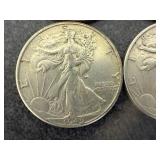 4 1945 Walking Liberty Half Dollars
